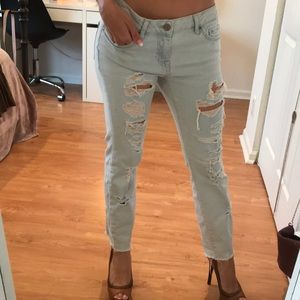 Low rise, light wash distressed boyfriend jeans